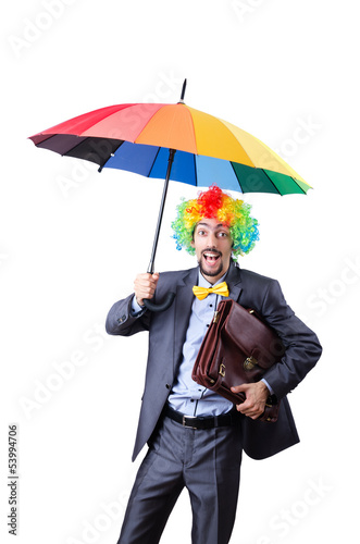 Photo: Clown businessman isolated on white Clown businessman isolated on white