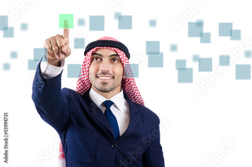 Photo: Arab man pressing virtual buttons Arab man pressing virtual buttons