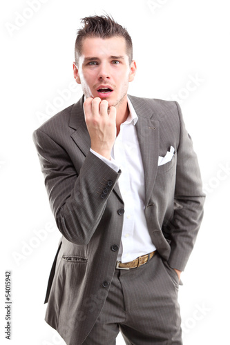 Photo: Portrait of young executive looking very excited Portrait of young executive looking very excited