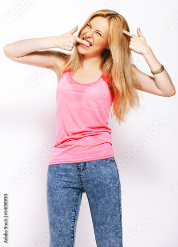 Photo: Happy beautiful blonde isolated on white. Happy beautiful blonde isolated on white.
