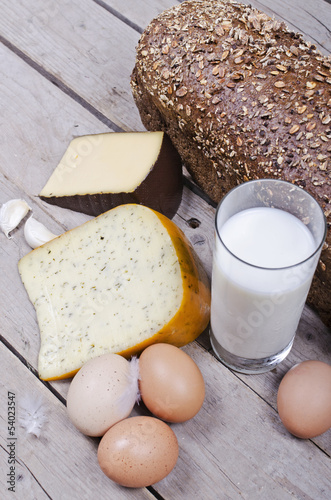 Photo: organic bread, cheese, eggs and milk organic bread, cheese, eggs and milk