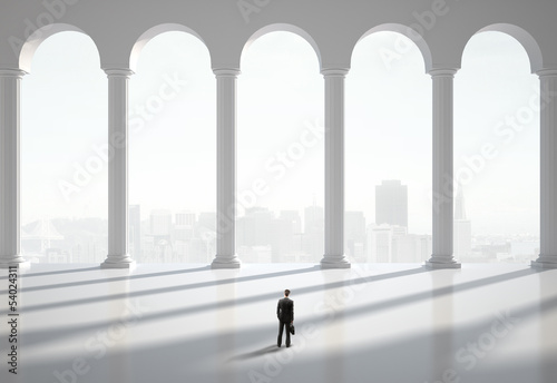 Photo: man in classic hall man in classic hall
