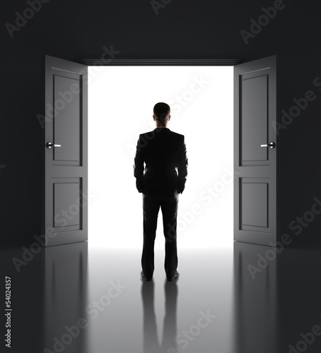 Photo: businessman and opened doors businessman and opened doors
