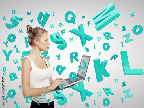 Photo: girl holding laptop girl holding laptop