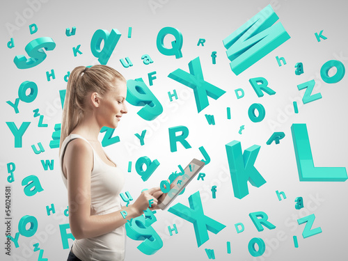 Photo: girl holding tablet girl holding tablet