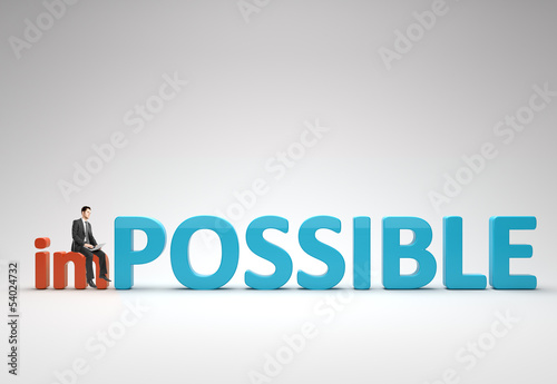 Photo: man sitting with notebook on impossible man sitting with notebook on impossible