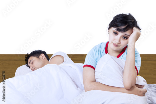 Photo: Asian couple insomnia isolated on white Asian couple insomnia isolated on white