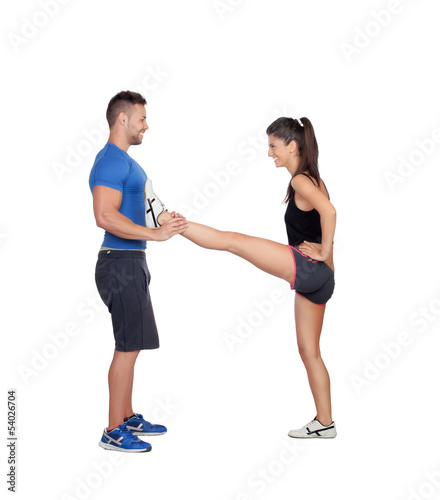 Photo: Gym women exercising with her personal trainer Gym women exercising with her personal trainer