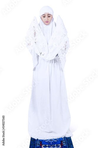 Photo: Young muslim woman praying Young muslim woman praying