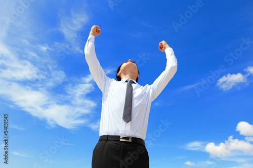 Photo: happy business man arise arms happy business man arise arms