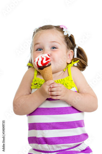 Photo: funny kid girl eating ice cream isolated funny kid girl eating ice cream isolated