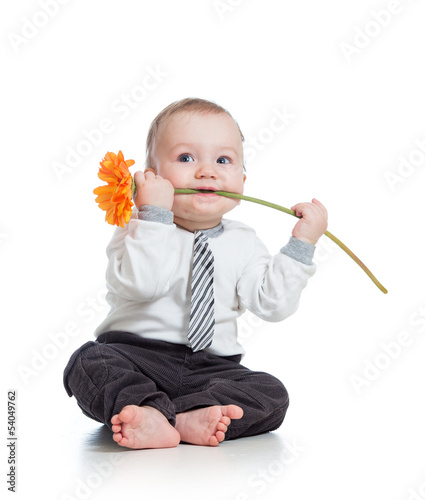 Photo: funny boy with flower , isolated on white funny boy with flower , isolated on white