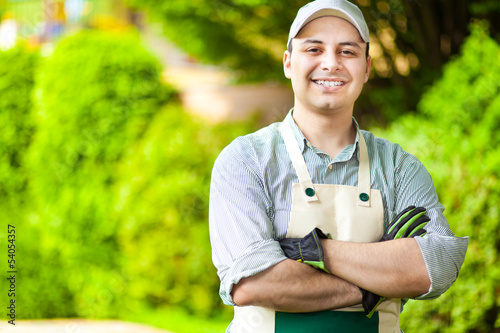 Photo: Handsome gardener smiling Handsome gardener smiling
