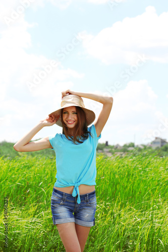 Photo: Portrait of beautiful young woman, outdoors Portrait of beautiful young woman, outdoors