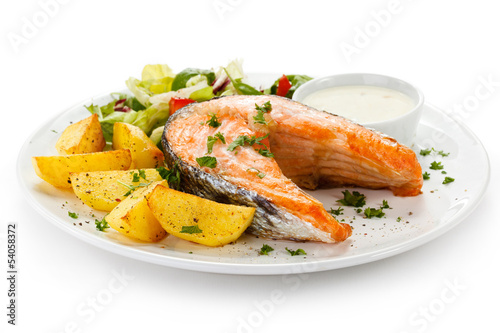 Photo: Grilled salmon, baked potatoes and vegetables Grilled salmon, baked potatoes and vegetables