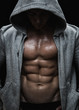 Close up of muscular sports man after weights training Close up of muscular sports man after weights training