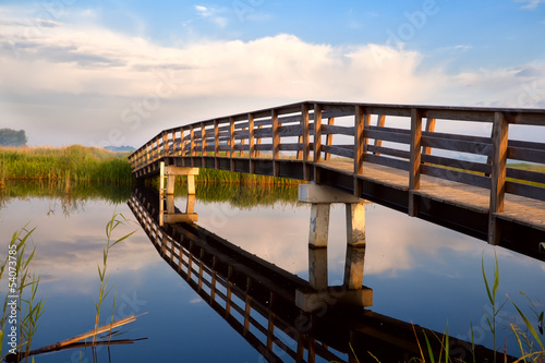 Photo: wooden bridge over river wooden bridge over river