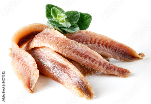 Photo: anchovies on white with oregano anchovies on white with oregano