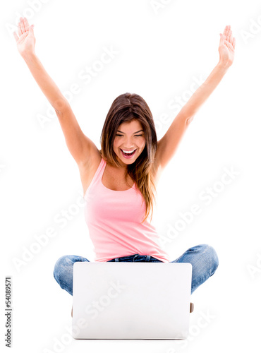 Photo: Happy woman with a laptop Happy woman with a laptop