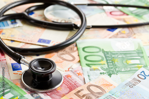 Photo: stethoscope and the euro banknotes stethoscope and the euro banknotes