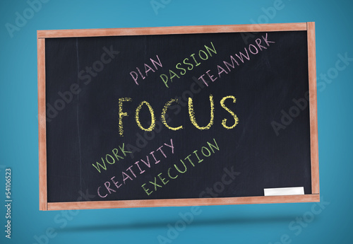 Photo: Focus terms written on chalkboard with a chalk Focus terms written on chalkboard with a chalk