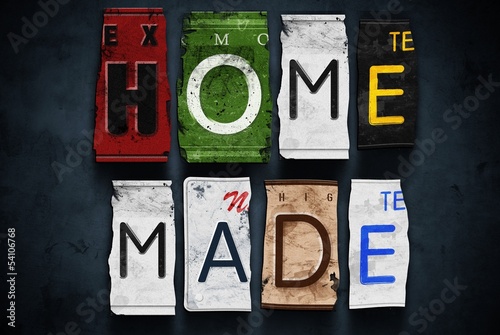 Illustration: Home made word on vintage car license plates, concept sign Home made word on vintage car license plates, concept sign