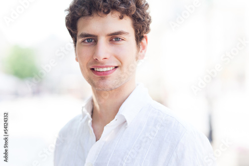 Photo: Young man smiling Young man smiling