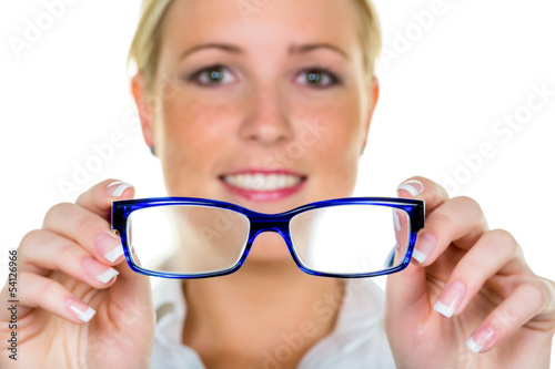 Photo: Frau hält eine Brille Frau hält eine Brille