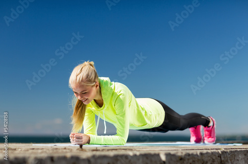 Photo: woman doing sports outdoors woman doing sports outdoors