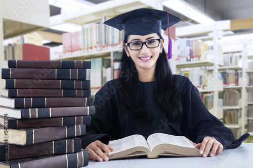 Photo: Diligent student in library Diligent student in library