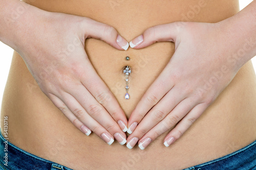 Photo: Frau hat Hände am Bauch Frau hat Hände am Bauch