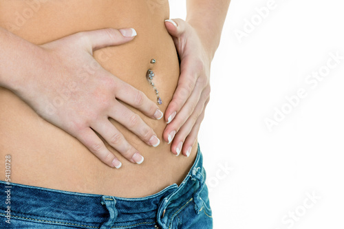 Photo: Frau hat Hände am Bauch Frau hat Hände am Bauch