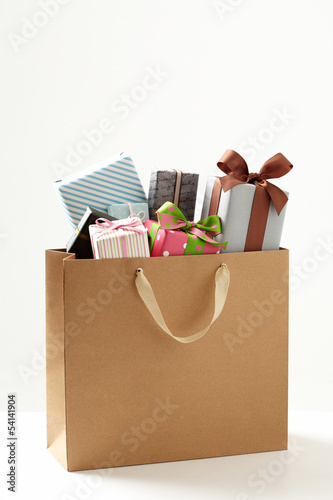 Photo: shopping bag with Gift box of white background. shopping bag with Gift box of white background.