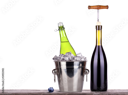 Photo: red wine and champagne bottle isolated red wine and champagne bottle isolated