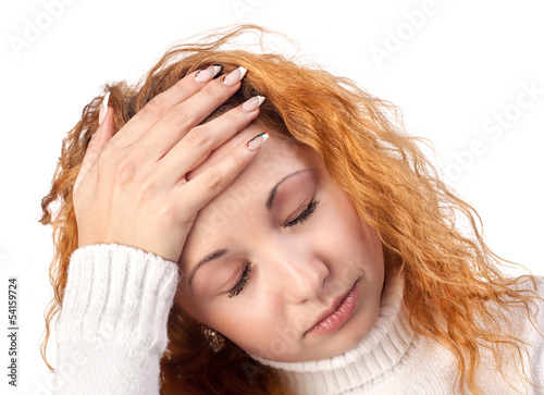 Photo: woman suffering from headache woman suffering from headache