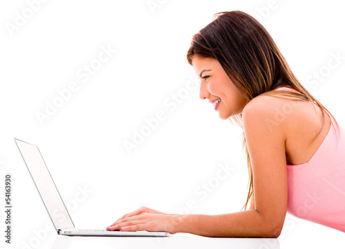 Photo: Woman working on a laptop Woman working on a laptop