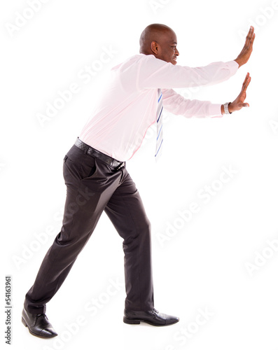 Photo: Business man pushing Business man pushing