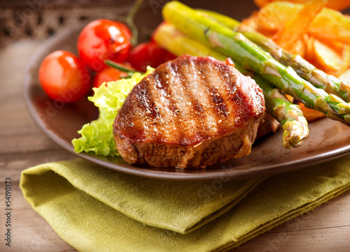 Photo: Grilled Beef Steak Meat with Vegetables Grilled Beef Steak Meat with Vegetables