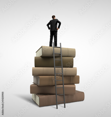 Photo: businessman standing on books businessman standing on books