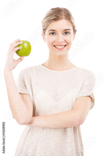 Photo: Beautiful woman with a green apple Beautiful woman with a green apple