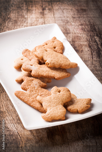 Photo: gingerbread on wooden table gingerbread on wooden table