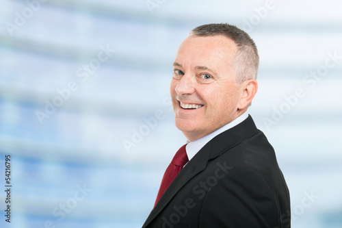 Photo: Smiling businessman portrait Smiling businessman portrait