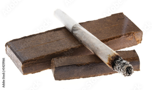 Photo: Lit Joint & Two Pieces of Hashish Lit Joint & Two Pieces of Hashish