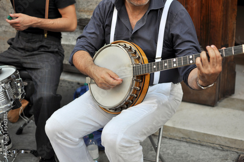 Photo: Artista di strada con banjo Artista di strada con banjo
