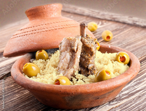 Photo: Moroccan tagine with lamb ribs, couscous and olives Moroccan tagine with lamb ribs, couscous and olives