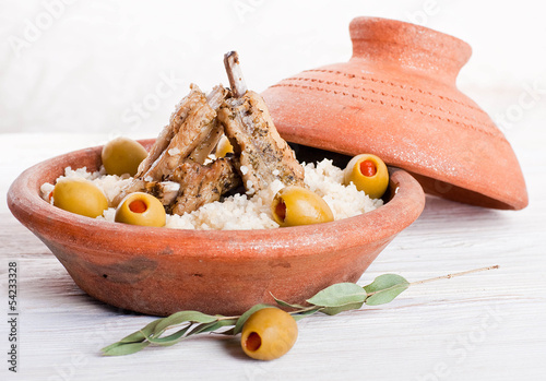 Photo: Moroccan tagine with lamb ribs, couscous and olives Moroccan tagine with lamb ribs, couscous and olives