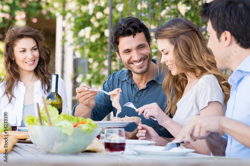 Photo: Happy Friends Having Lunch Happy Friends Having Lunch