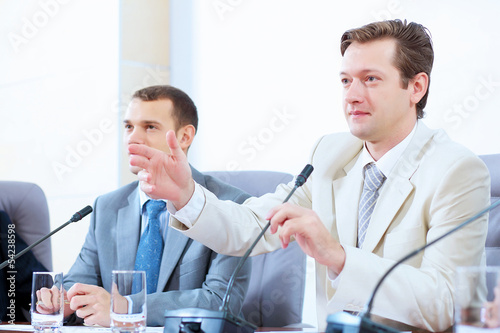 Photo: Two businesspeople at meeting Two businesspeople at meeting