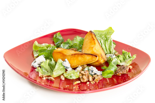 Photo: Salad with caramelised pears,walnuts and blue cheese, on red pla Salad with caramelised pears,walnuts and blue cheese, on red pla