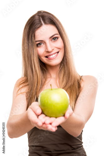 Photo: Portrait of a young woman eating green apple Portrait of a young woman eating green apple